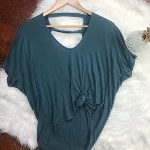 Cropped Flowly low back shirt- size medium